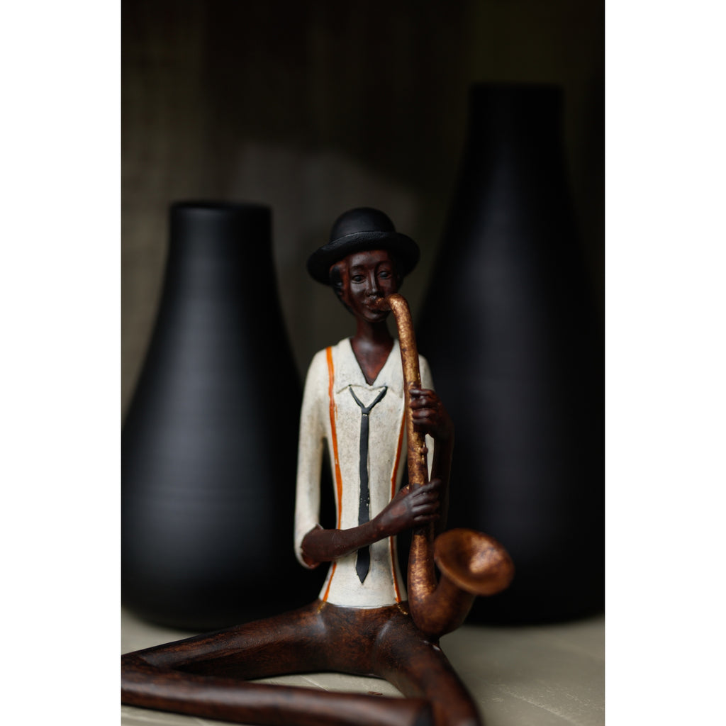 Blue Note Seated Saxophonist – view 3