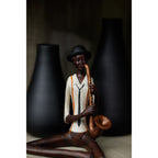 Blue Note Seated Saxophonist – view 3